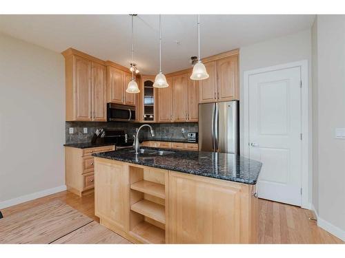 306-5110 36 Street, Red Deer, AB - Indoor Photo Showing Kitchen With Stainless Steel Kitchen With Double Sink With Upgraded Kitchen