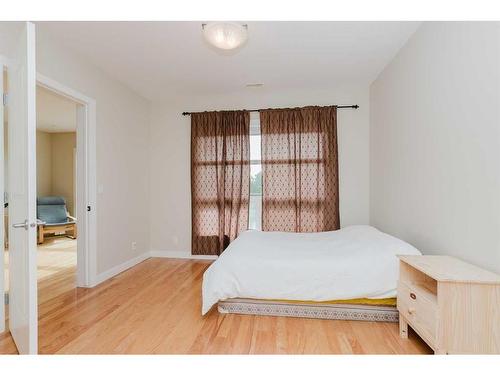 306-5110 36 Street, Red Deer, AB - Indoor Photo Showing Bedroom