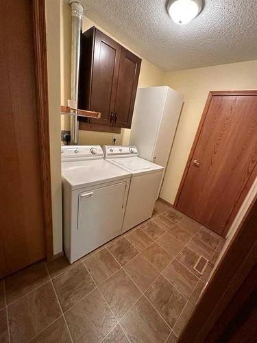 5103 46 Avenue, Ponoka, AB - Indoor Photo Showing Laundry Room