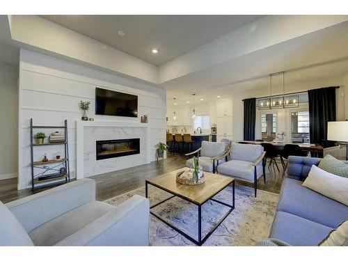 24 Lundberg Crescent, Red Deer, AB - Indoor Photo Showing Living Room With Fireplace