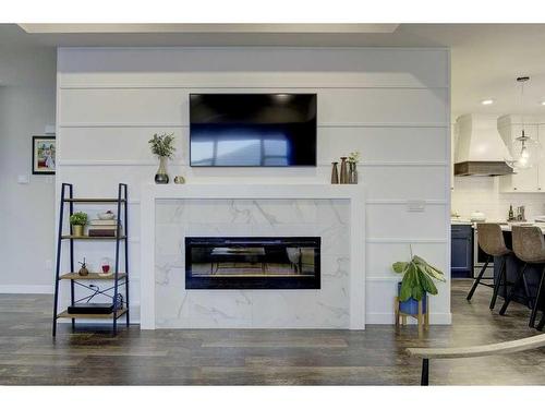 24 Lundberg Crescent, Red Deer, AB - Indoor Photo Showing Living Room With Fireplace