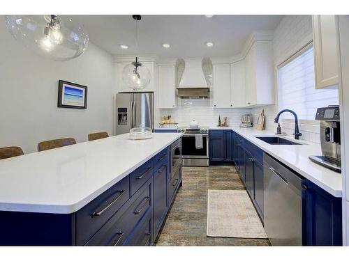 24 Lundberg Crescent, Red Deer, AB - Indoor Photo Showing Kitchen With Upgraded Kitchen