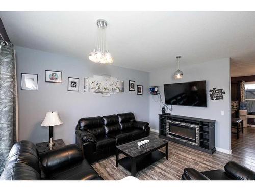 4926 Fox Drive, Clive, AB - Indoor Photo Showing Living Room