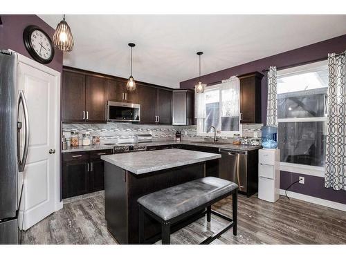 4926 Fox Drive, Clive, AB - Indoor Photo Showing Kitchen With Stainless Steel Kitchen With Upgraded Kitchen