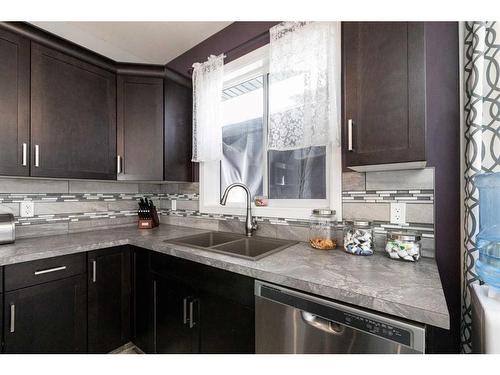 4926 Fox Drive, Clive, AB - Indoor Photo Showing Kitchen With Double Sink