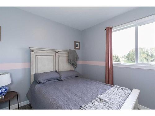 4926 Fox Drive, Clive, AB - Indoor Photo Showing Bedroom