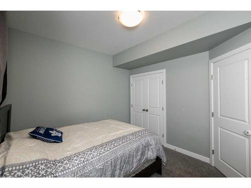 4926 Fox Drive, Clive, AB - Indoor Photo Showing Bedroom