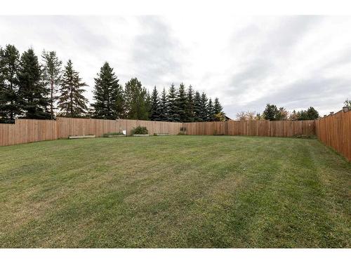 4926 Fox Drive, Clive, AB - Outdoor With Backyard