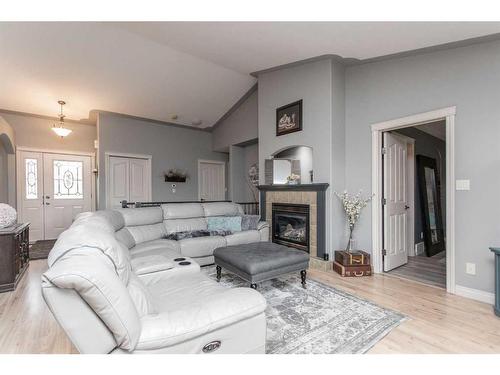 73-27121 Township Road 402, Rural Lacombe County, AB - Indoor Photo Showing Living Room With Fireplace