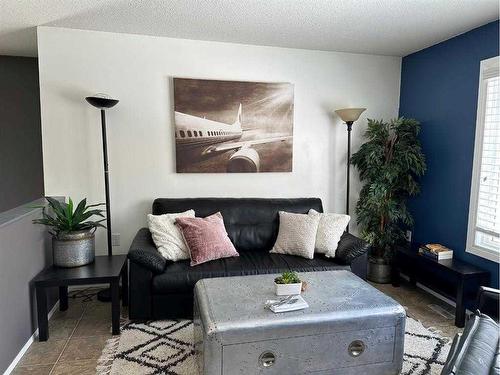 64 Tawatinaw Drive, Athabasca, AB - Indoor Photo Showing Living Room