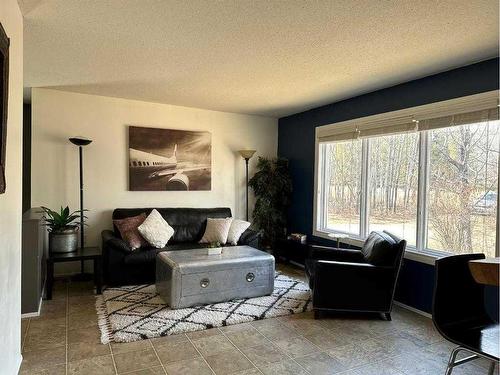 64 Tawatinaw Drive, Athabasca, AB - Indoor Photo Showing Living Room