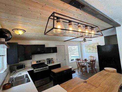 64 Tawatinaw Drive, Athabasca, AB - Indoor Photo Showing Kitchen With Double Sink