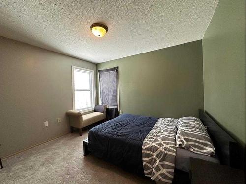 64 Tawatinaw Drive, Athabasca, AB - Indoor Photo Showing Bedroom