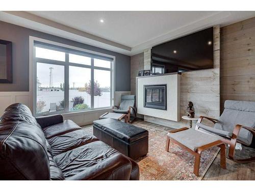 93 Longmire Close, Red Deer, AB - Indoor Photo Showing Living Room With Fireplace