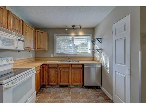 5451 76 Street, Red Deer, AB - Indoor Photo Showing Kitchen With Double Sink