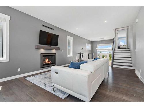 1 Toal Close, Red Deer, AB - Indoor Photo Showing Living Room With Fireplace