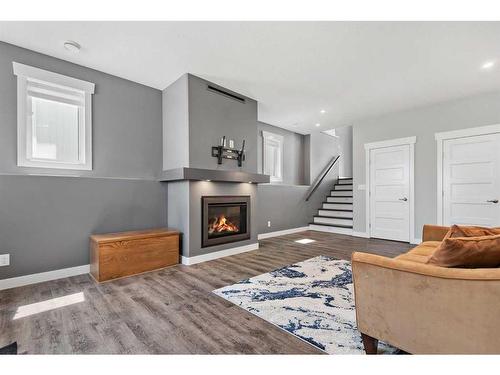 1 Toal Close, Red Deer, AB - Indoor Photo Showing Living Room With Fireplace