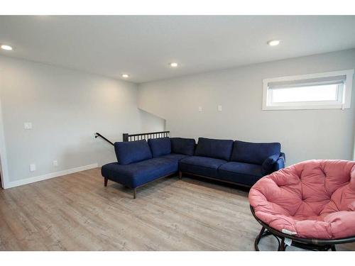 33 Larratt Close, Red Deer, AB - Indoor Photo Showing Living Room