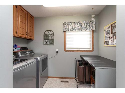 12 Pickwick Lane, Lacombe, AB - Indoor Photo Showing Laundry Room