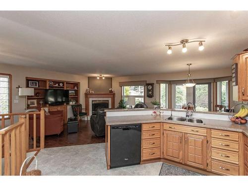 12 Pickwick Lane, Lacombe, AB - Indoor Photo Showing Kitchen With Double Sink