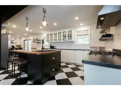 5244 38 Street Crescent, Innisfail, AB - Indoor Photo Showing Kitchen With Double Sink With Upgraded Kitchen