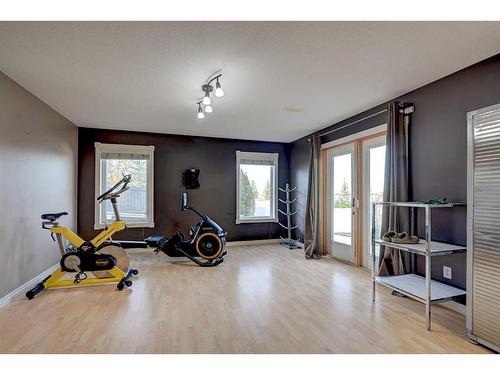 76 Burris Pointe, Lacombe, AB - Indoor Photo Showing Gym Room