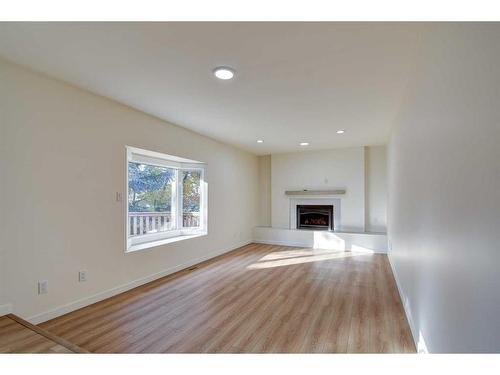 120 Pamely Avenue, Red Deer, AB - Indoor Photo Showing Living Room With Fireplace