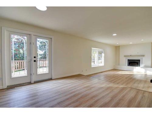 120 Pamely Avenue, Red Deer, AB - Indoor Photo Showing Other Room With Fireplace