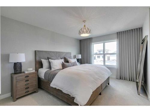 32 Treeline Manor Sw, Calgary, AB - Indoor Photo Showing Bedroom