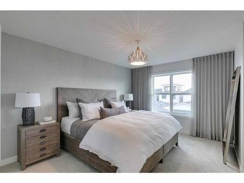 32 Treeline Manor Sw, Calgary, AB - Indoor Photo Showing Bedroom