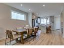 32 Treeline Manor Sw, Calgary, AB  - Indoor Photo Showing Dining Room 