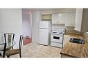 5305 Windsor Avenue, Coronation, AB  - Indoor Photo Showing Kitchen With Double Sink 