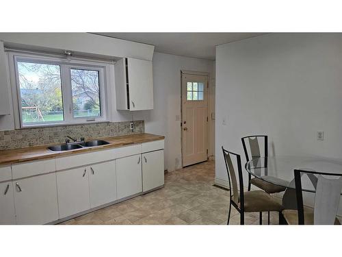 5305 Windsor Avenue, Coronation, AB - Indoor Photo Showing Kitchen With Double Sink