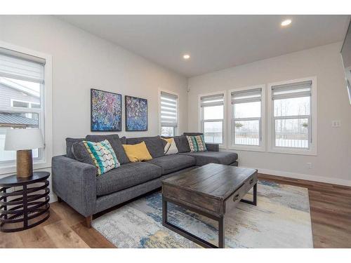 77 Longmire Close, Red Deer, AB - Indoor Photo Showing Living Room