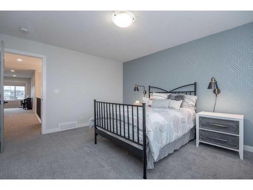 77 Longmire Close, Red Deer, AB - Indoor Photo Showing Bedroom