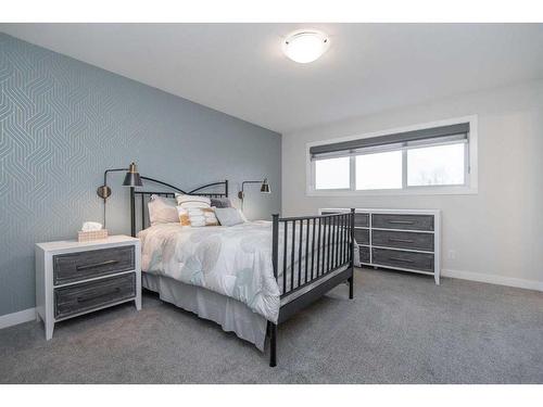 77 Longmire Close, Red Deer, AB - Indoor Photo Showing Bedroom