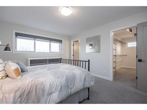 77 Longmire Close, Red Deer, AB - Indoor Photo Showing Bedroom