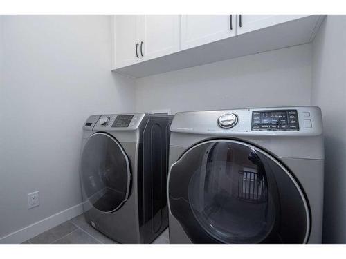 77 Longmire Close, Red Deer, AB - Indoor Photo Showing Laundry Room