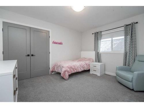 77 Longmire Close, Red Deer, AB - Indoor Photo Showing Bedroom