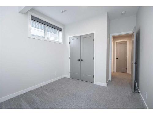 77 Longmire Close, Red Deer, AB - Indoor Photo Showing Other Room