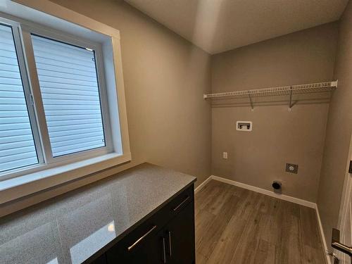 84 Key Cove Sw, Airdrie, AB - Indoor Photo Showing Other Room