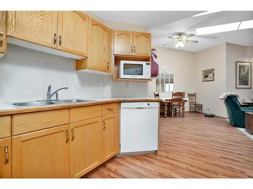 2-5120 52 Street, Lacombe, AB - Indoor Photo Showing Kitchen With Double Sink