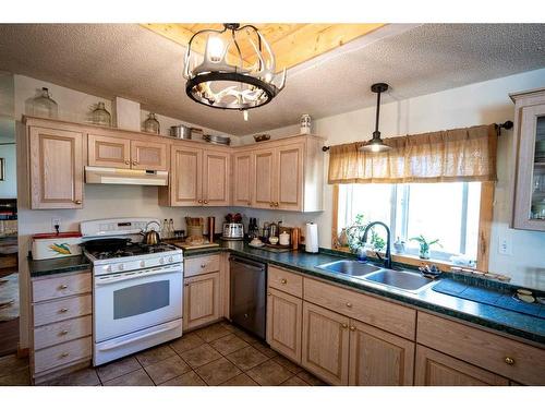 364011-761 Highway, Rural Clearwater County, AB - Indoor Photo Showing Kitchen With Double Sink