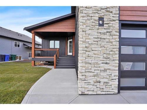 6613 58 Avenue, Innisfail, AB - Outdoor With Deck Patio Veranda With Facade