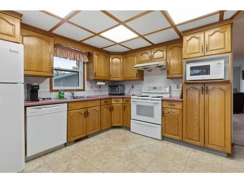 6520 49 Avenue, Camrose, AB - Indoor Photo Showing Kitchen With Double Sink