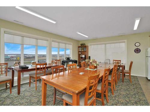 306-4425 Heritage Way, Lacombe, AB - Indoor Photo Showing Dining Room