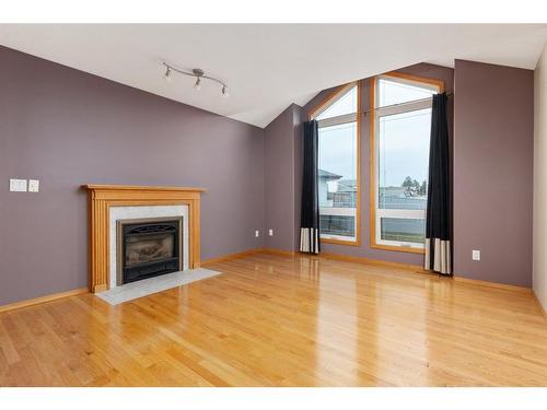 11 Lafond Drive, Tofield, AB - Indoor Photo Showing Living Room With Fireplace