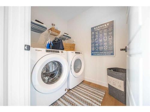 279 Rivercrest Boulevard, Cochrane, AB - Indoor Photo Showing Laundry Room