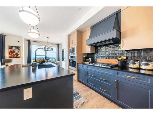 279 Rivercrest Boulevard, Cochrane, AB - Indoor Photo Showing Kitchen