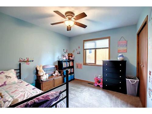 25 Ravenscrag Crescent, Norglenwold, AB - Indoor Photo Showing Bedroom